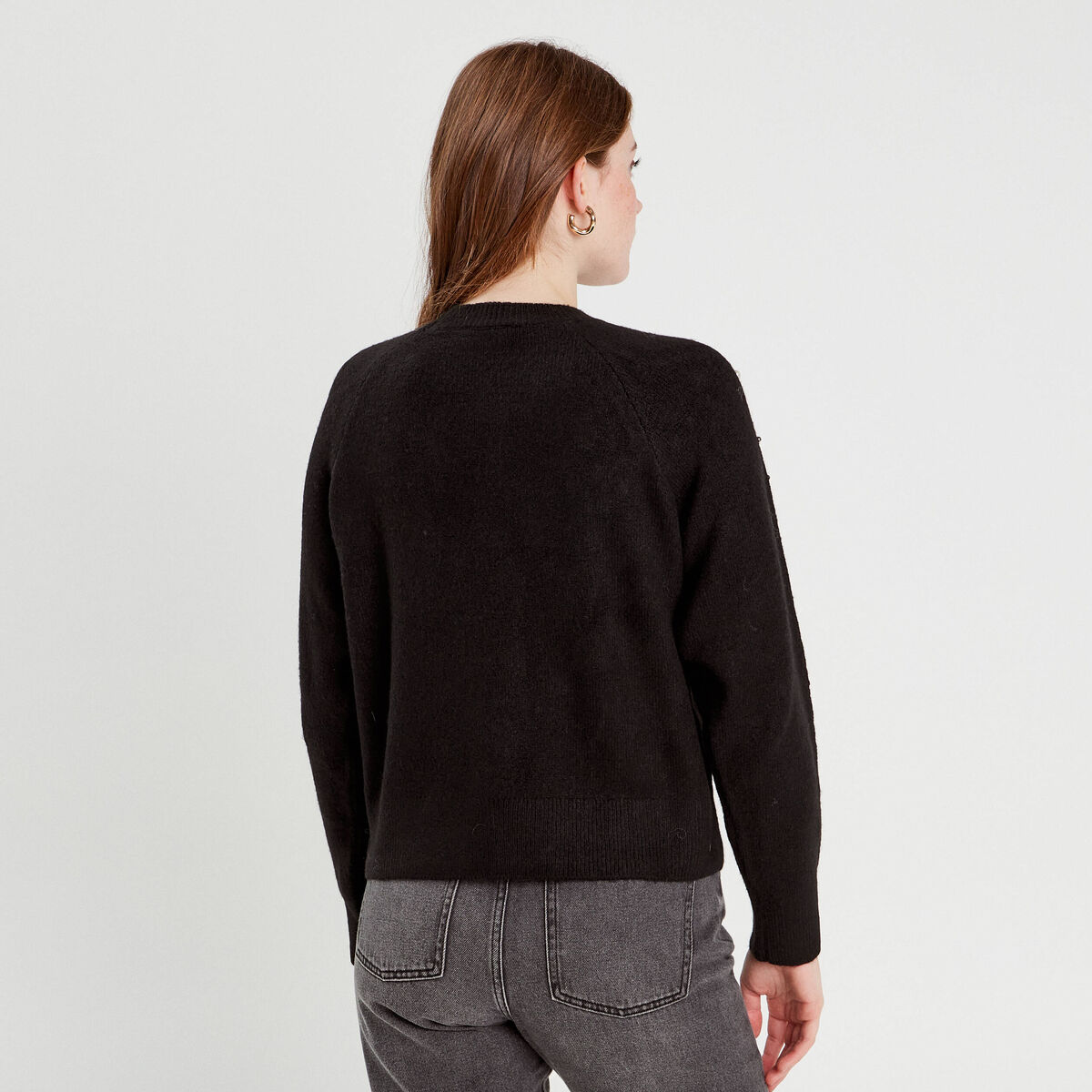 Pull perles et détails bijoux noir femme