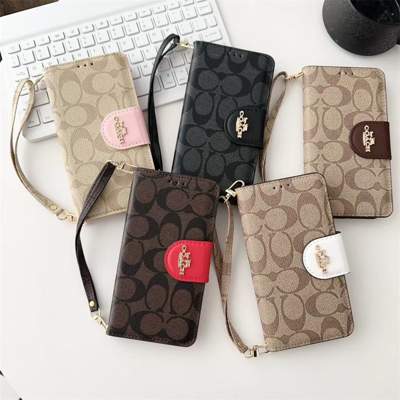コーチ iphone17/16proケース 手帳型 スマホケース ブランド iphone15/15pro max ケース 手帳 型 かわいい iphone14/14pro ケース ストラップ 付き iphone13/12 ケース coach カード収納 スタンド