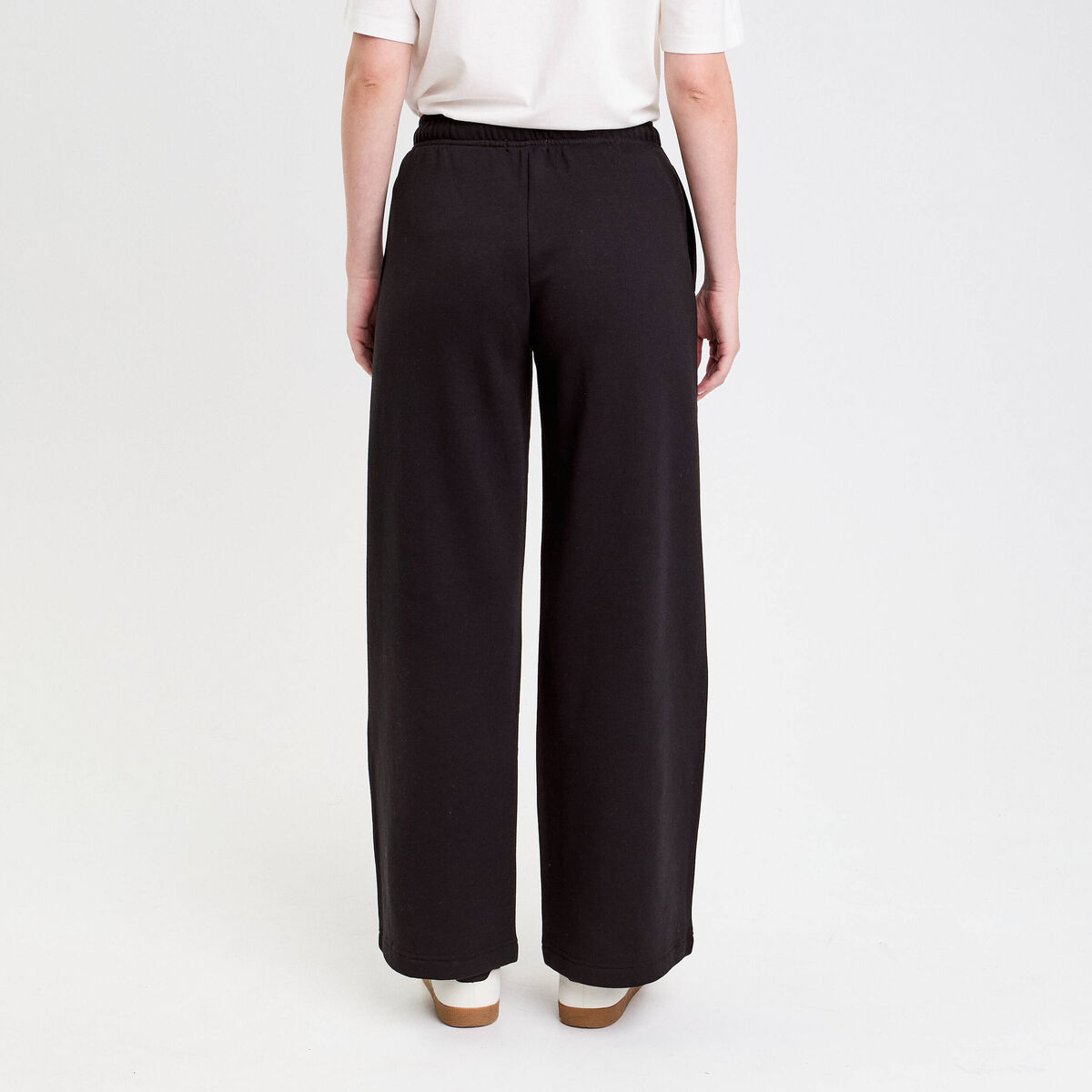 Pantalon large style jogging noir femme