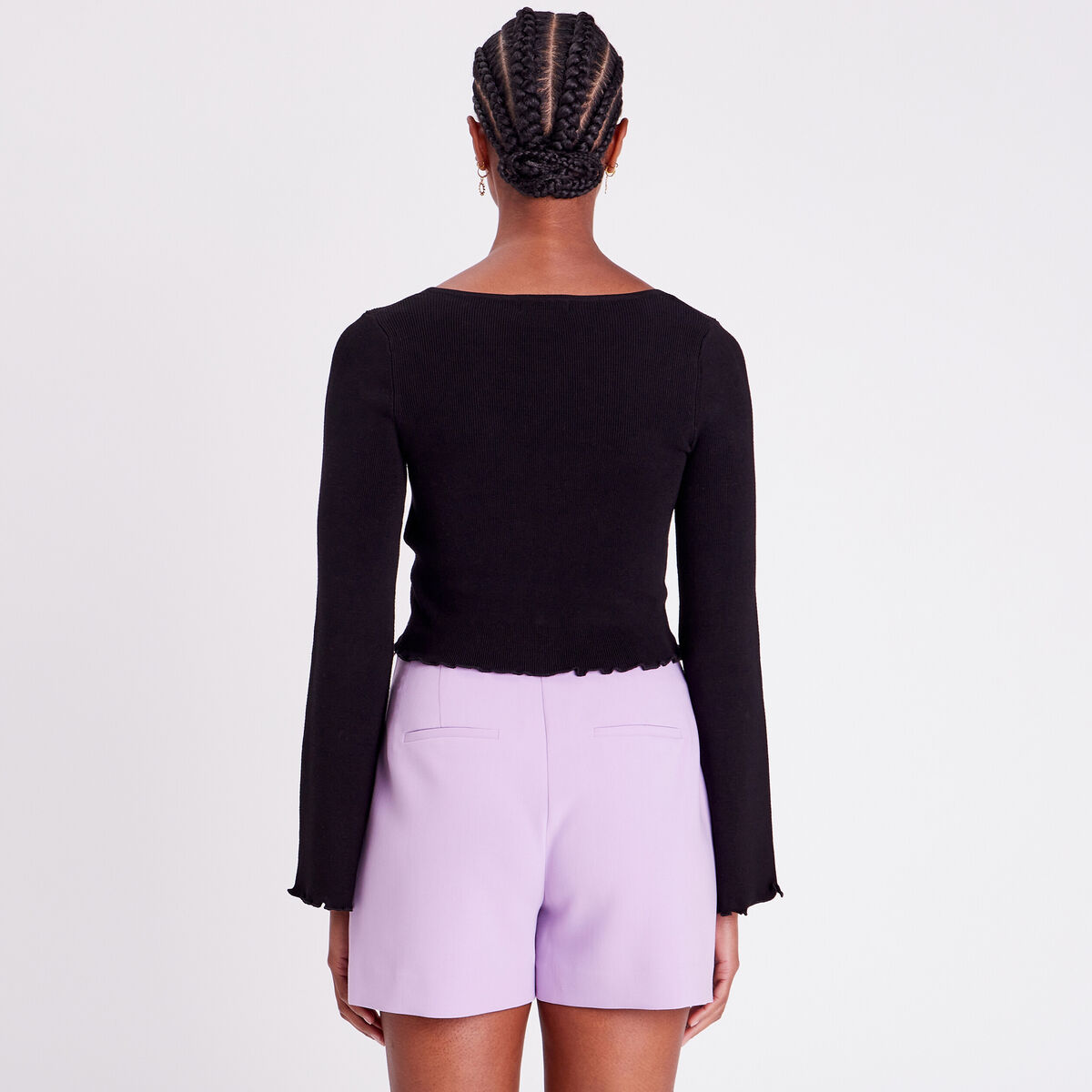 Gilet col en V bord vague noir femme