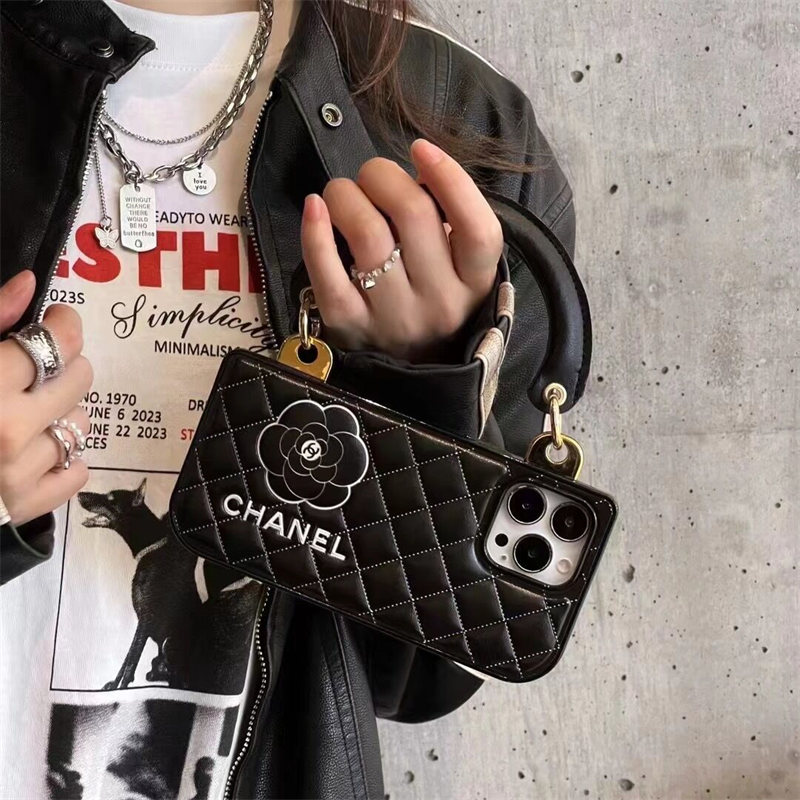 シャネル カメリア iphone15/15pro ケース バッグ 型 chanel 携帯ケース IPhone14/13 手持ちバンド 付き iphoneケース おそろい ブランド iphone ケース レディース ブランド カップル 白 黒