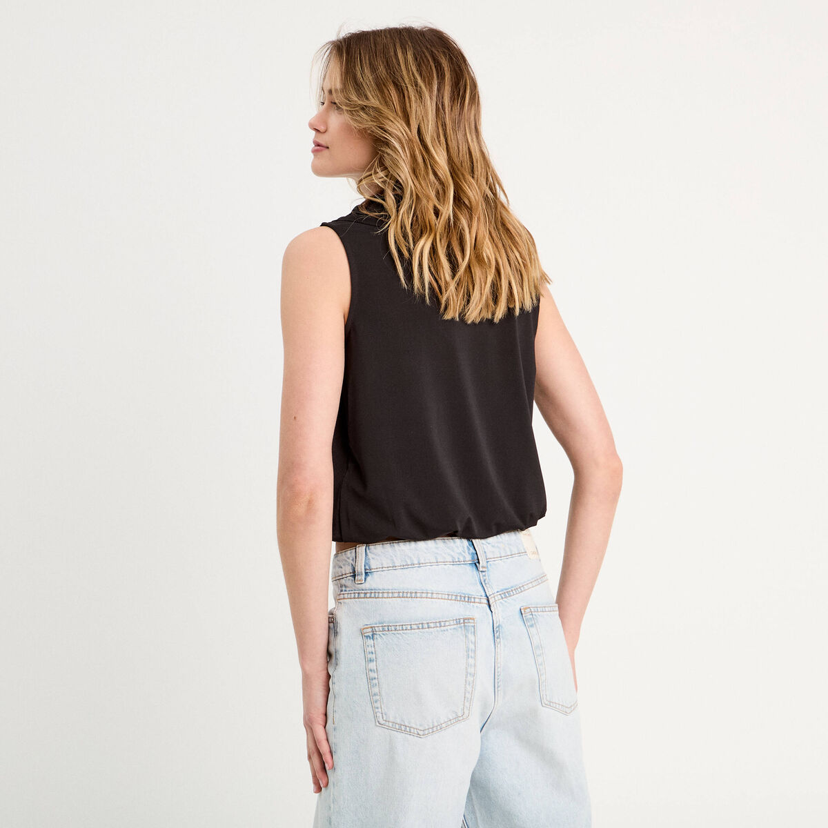 Blouse volants sans manches noir femme