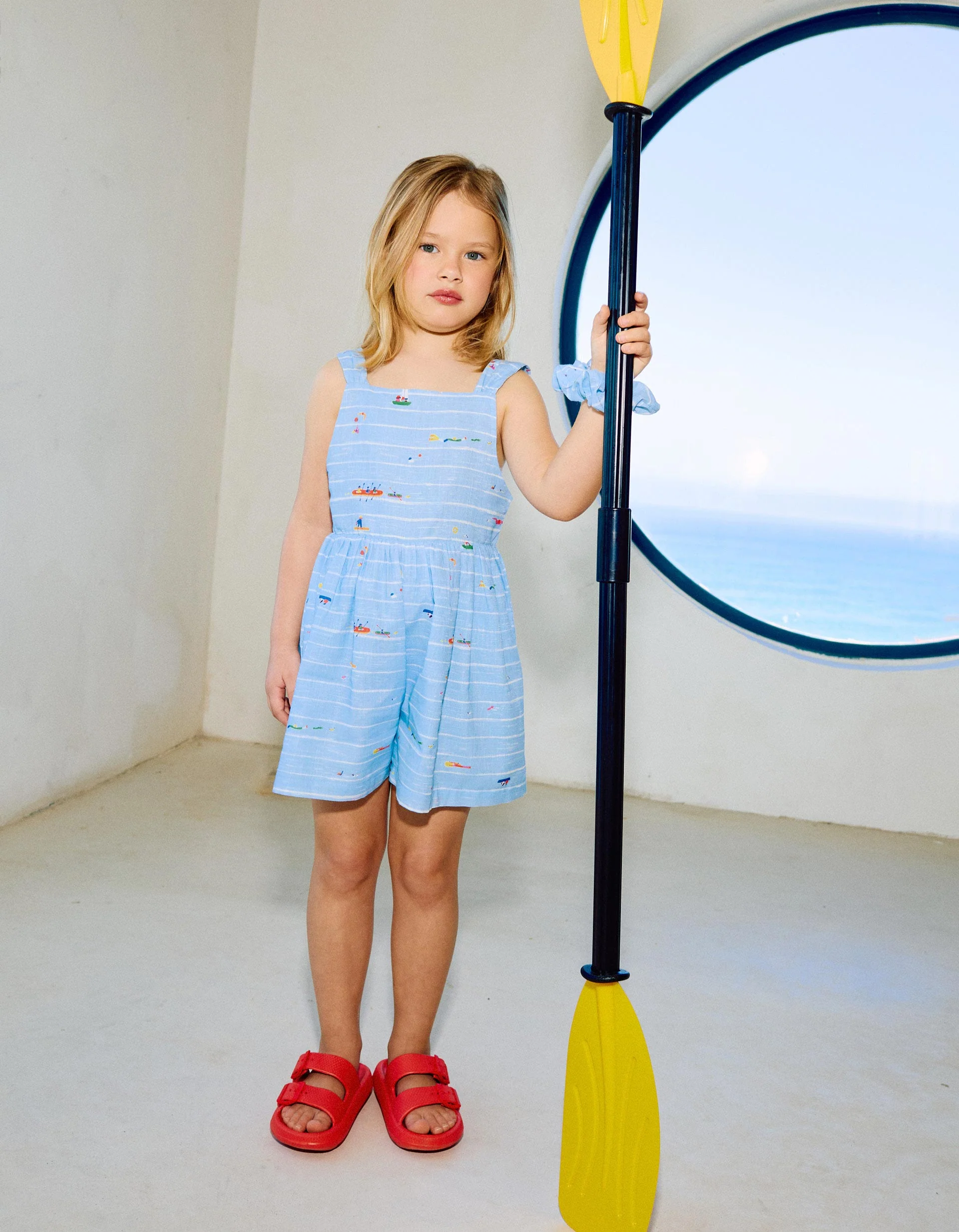 Cotton playsuit with print Carolina Celas x Zippy for girls, light blue
