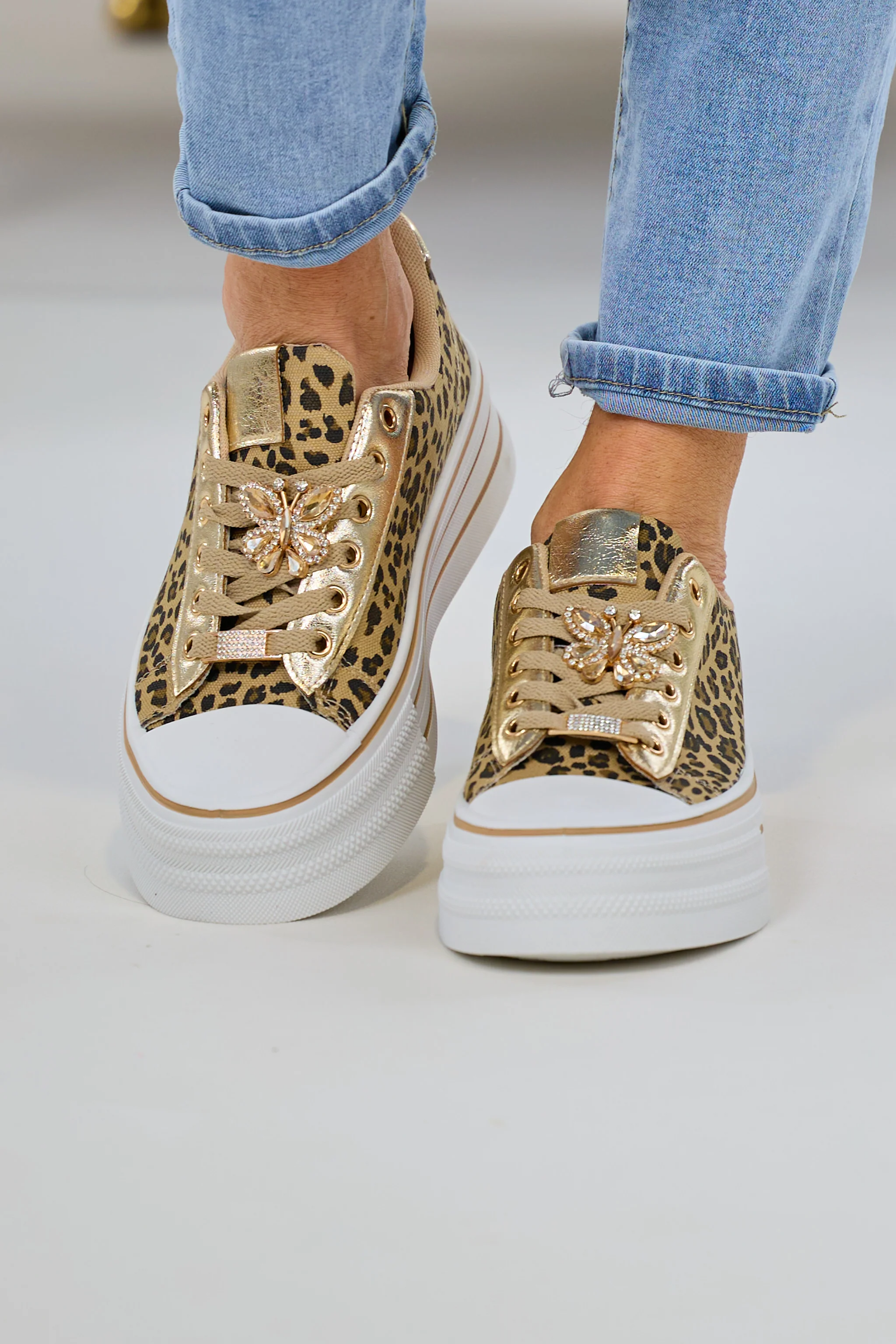 Sneaker im Leo Look mit Plateausohle, leo-gold