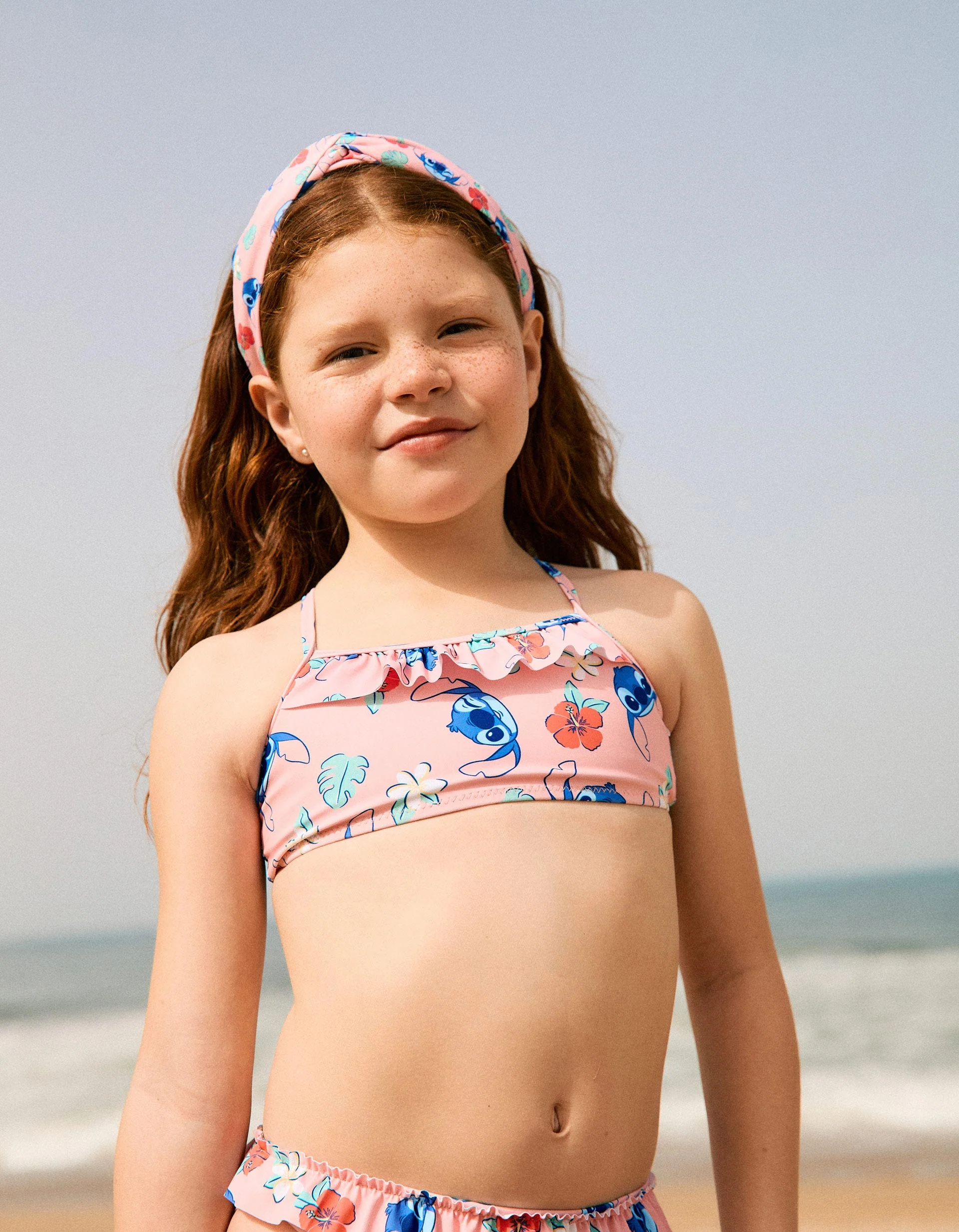 Bikini with Stitch motif and ruffles for girls, light pink