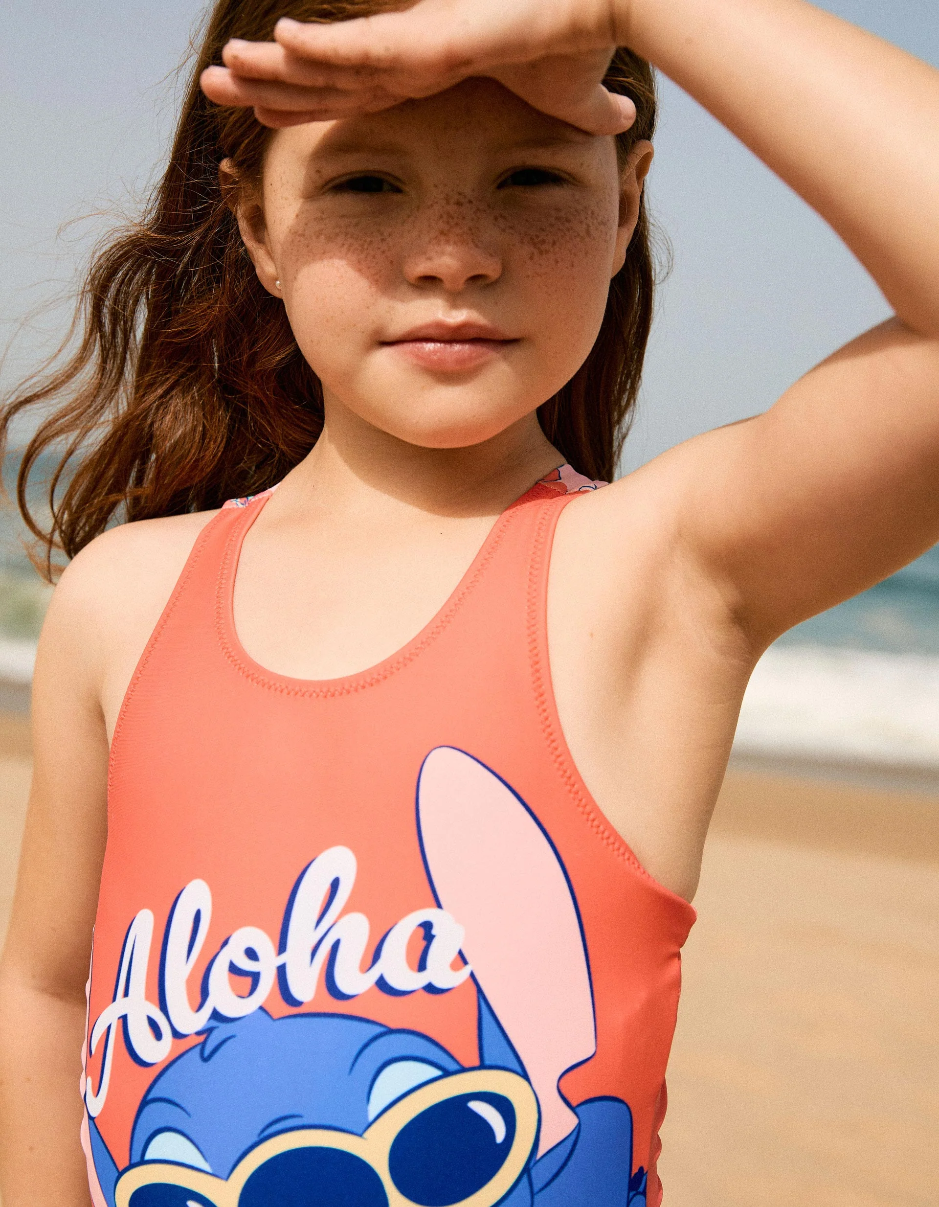 Swimsuit with Stitch print and crossed straps for girls, coral