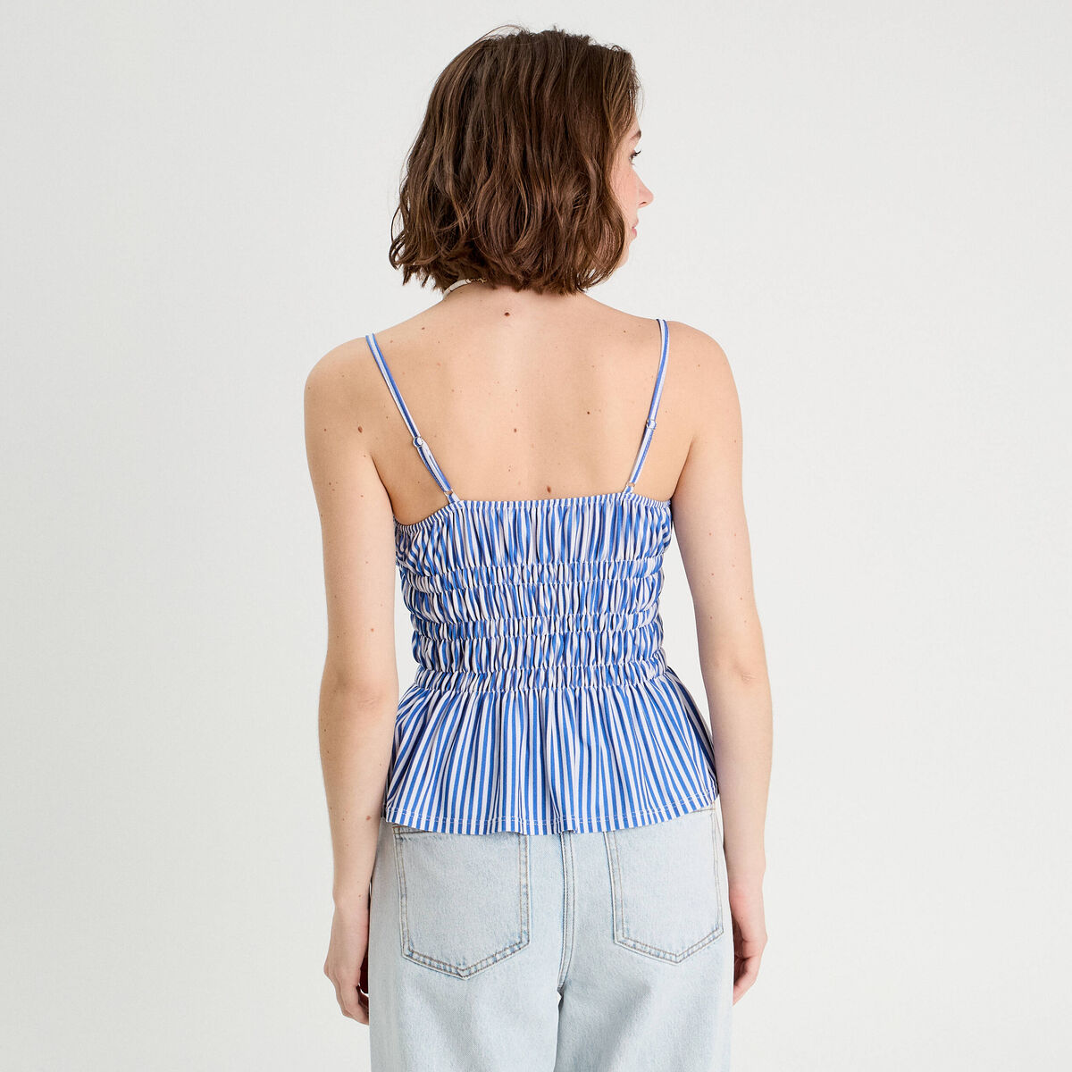 Débardeur smocké bretelles fines bleu clair femme