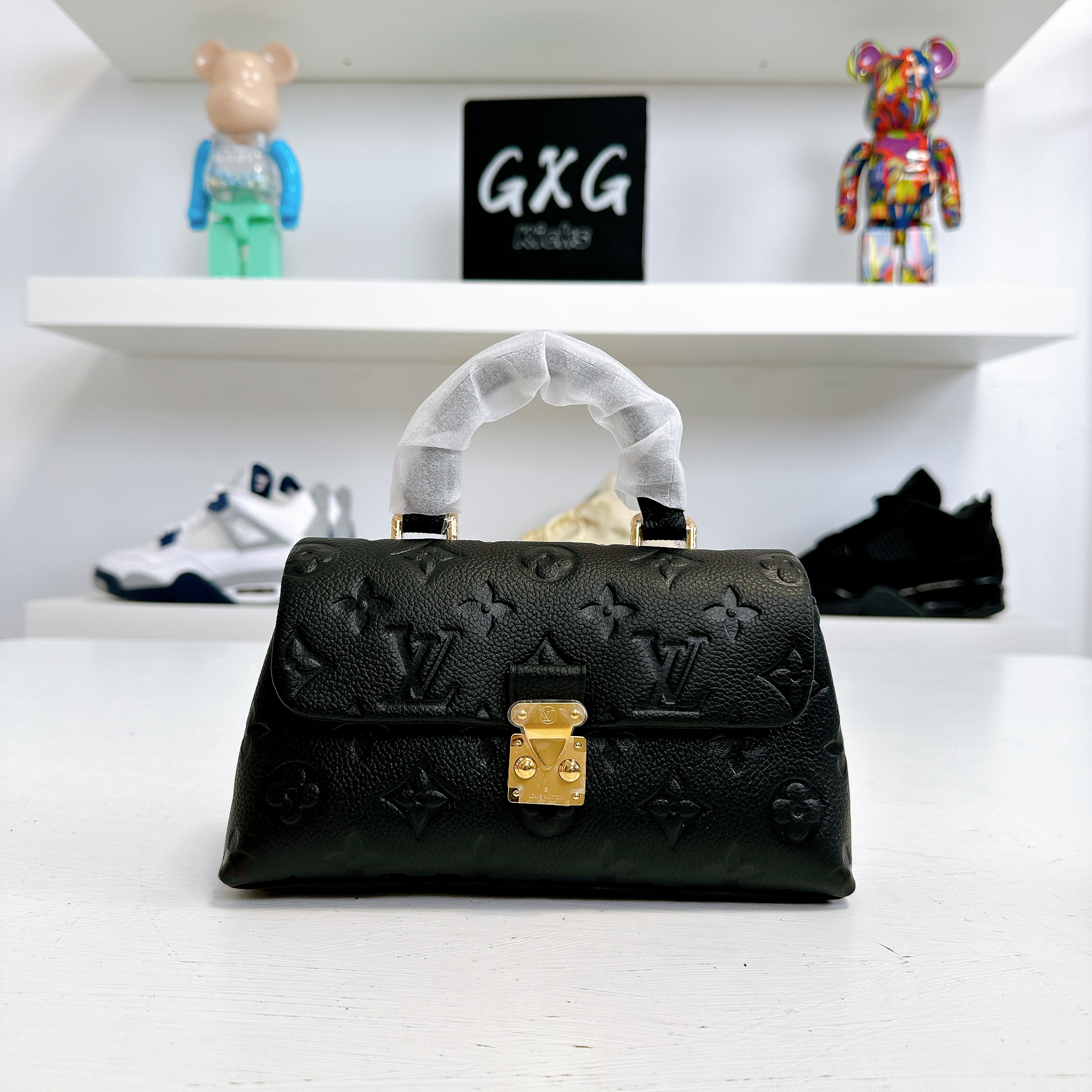 LOUIS VUITTON Nano Madeleine Monogram Empreinte Leather