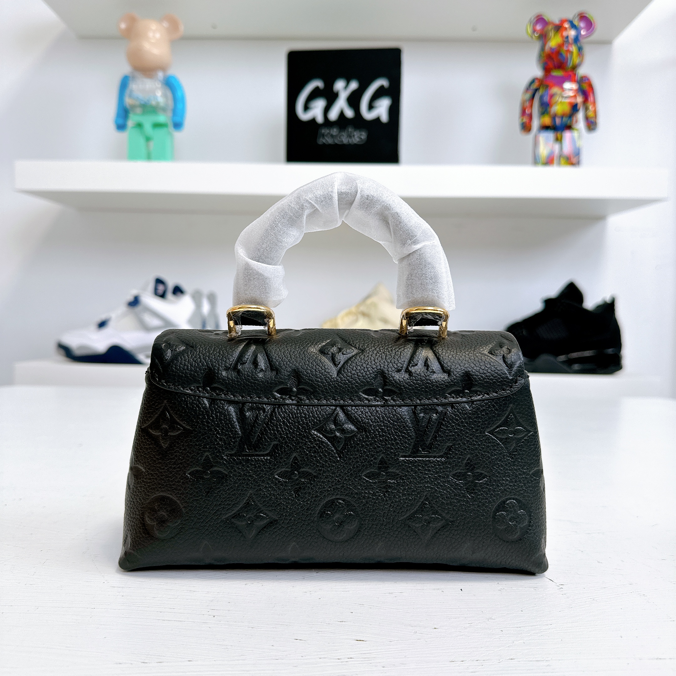 LOUIS VUITTON Nano Madeleine Monogram Empreinte Leather