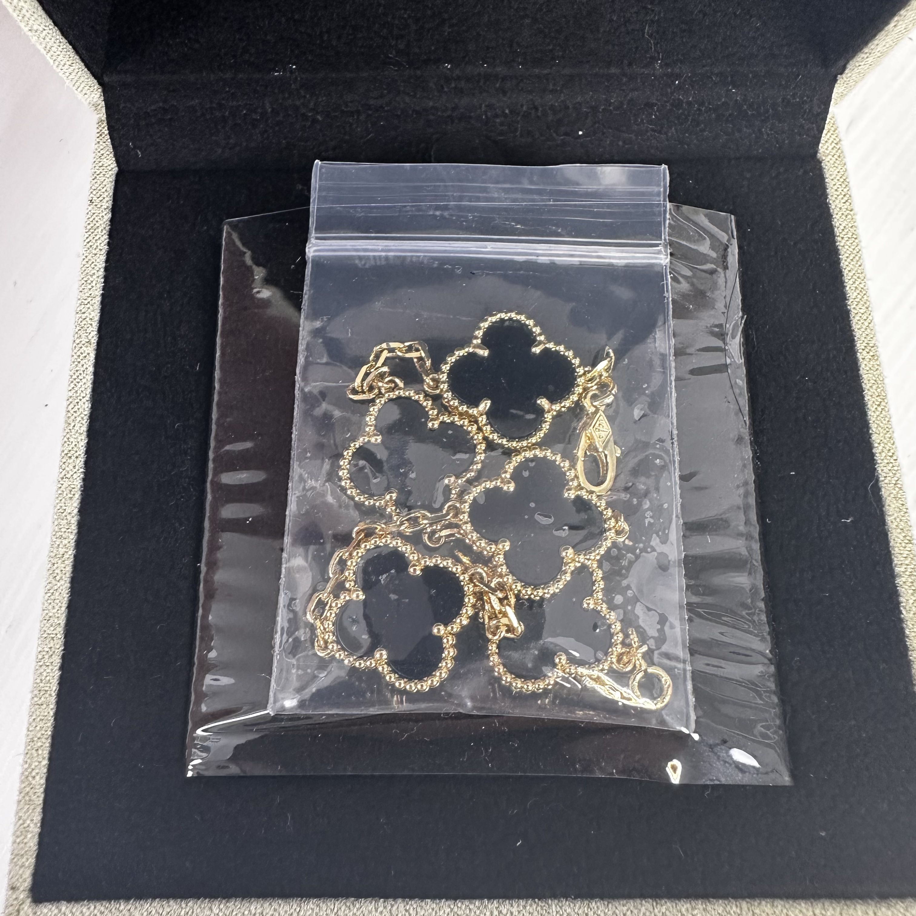 Van Cleef & Arpels Bracelet (Gold and Black)