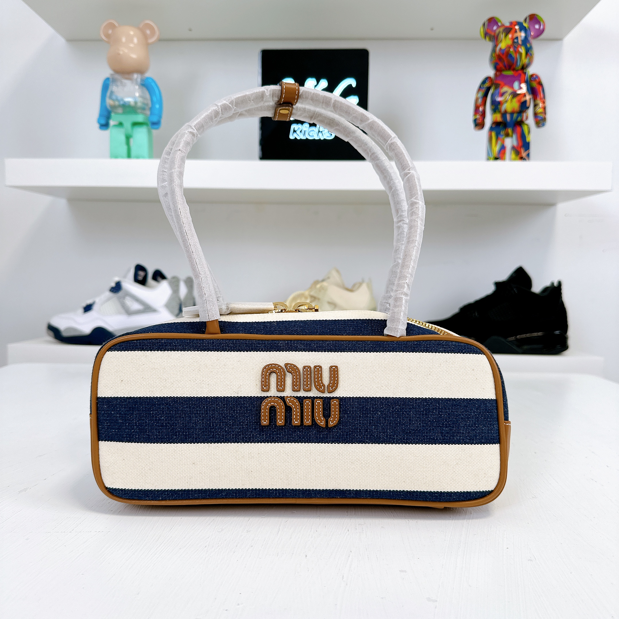 Bluebeige Beau Canvas And Leather Bag  Miu Miu