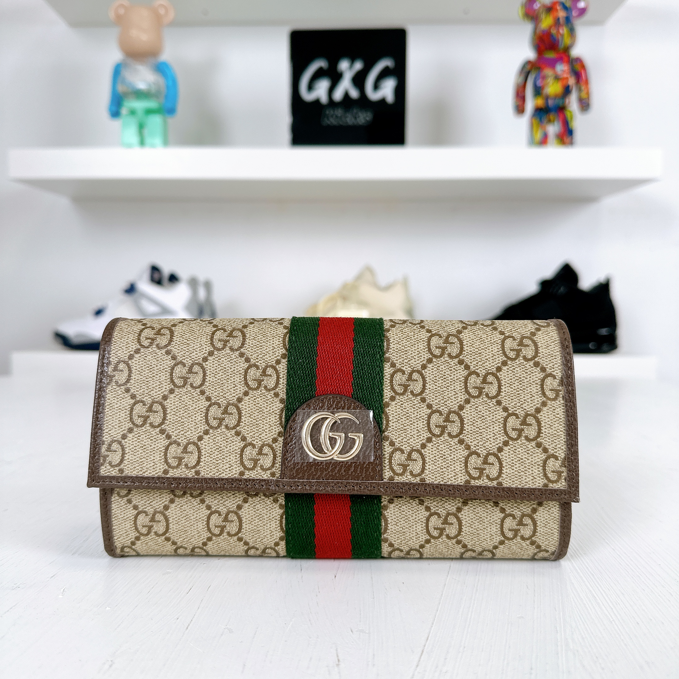 GUCCI Supreme GG fabric and leather wallet