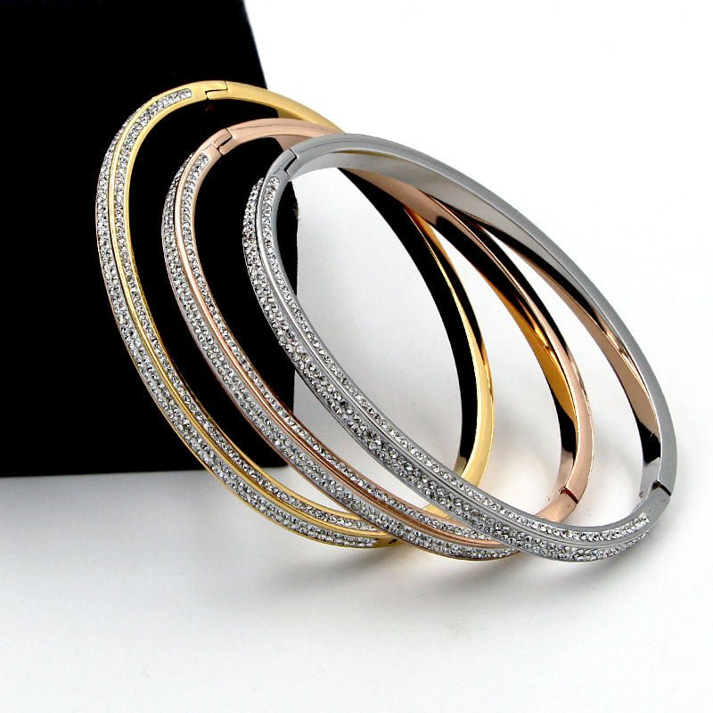Zirconite Stainless Steel hinged Bangle Bracelet. 709B11