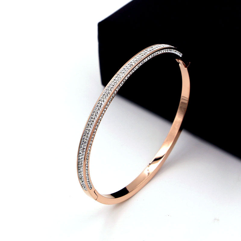 Zirconite Stainless Steel hinged Bangle Bracelet. 709B11