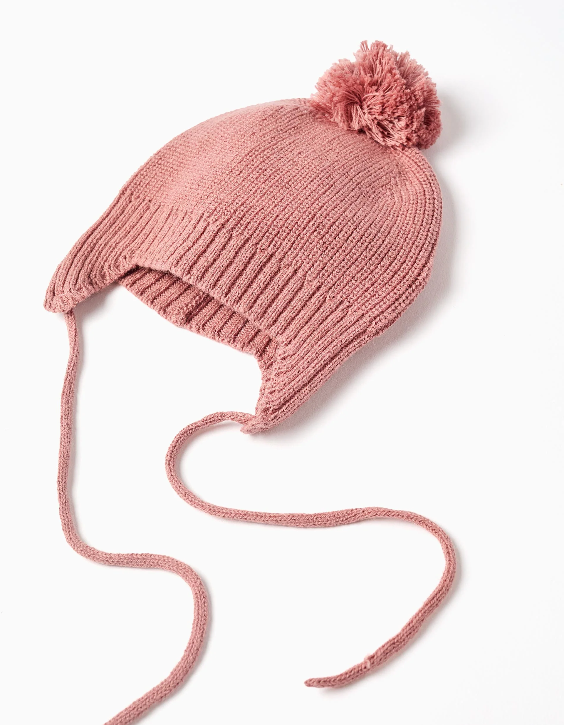 Knitted beanie with side straps and pompom for newborn girls, pink