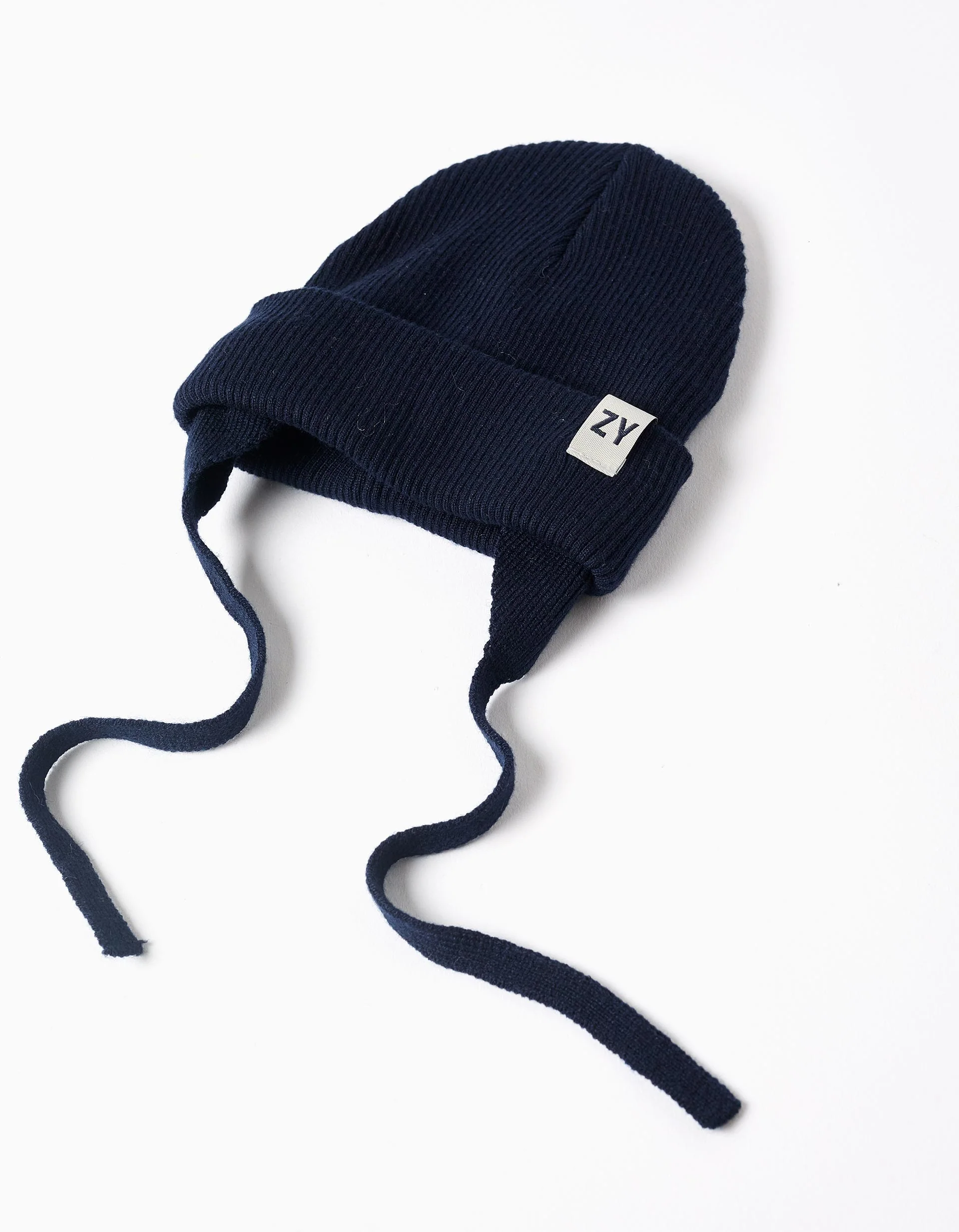 Knitted beanie with straps and ear protection for baby boys, dark blue