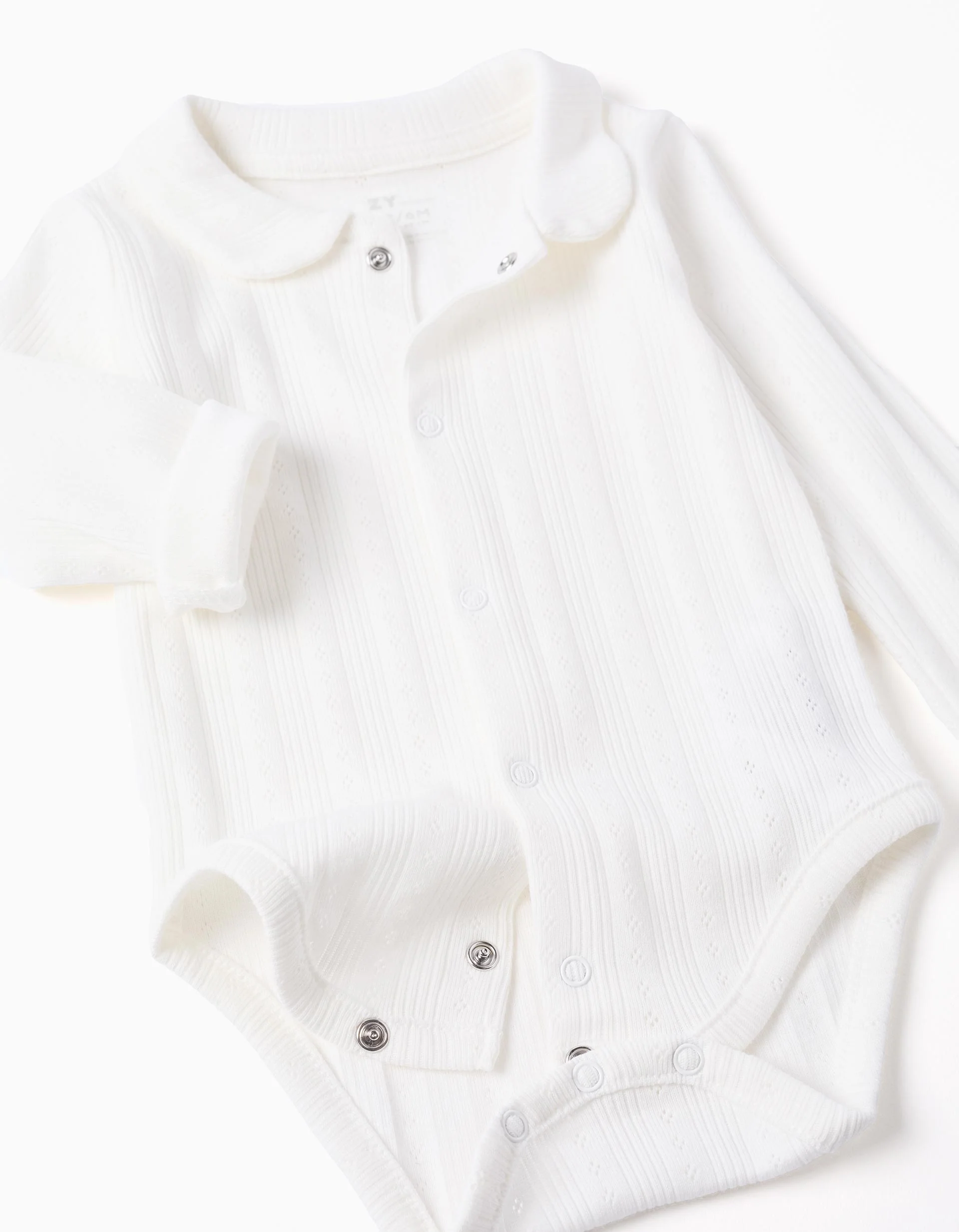 Long sleeve ribbed cotton bodysuit for newborns, white