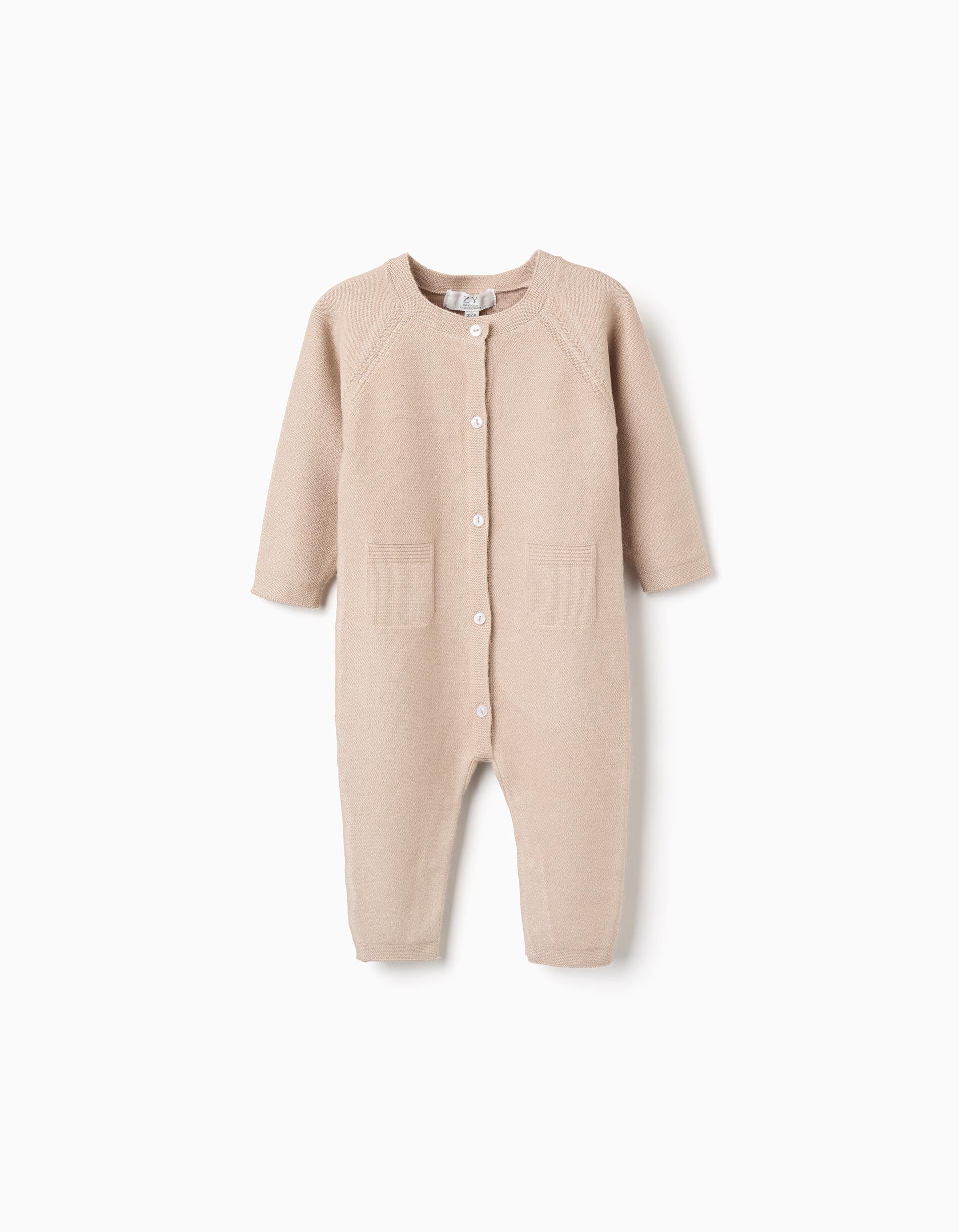 Knitted footless babygrow for newborn boy, beige