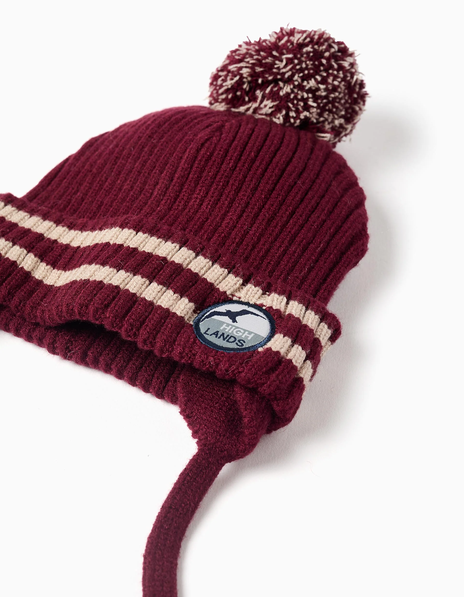 Knitted beanie with side straps and pompom for baby boys, dark red