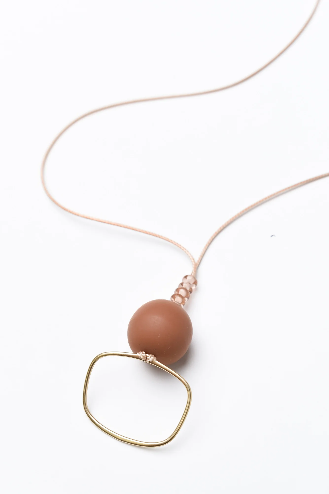 Aneth Rust Beaded Pendant Necklace